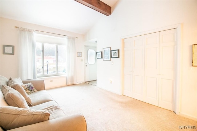 living area with light carpet, beamed ceiling, and high vaulted ceiling