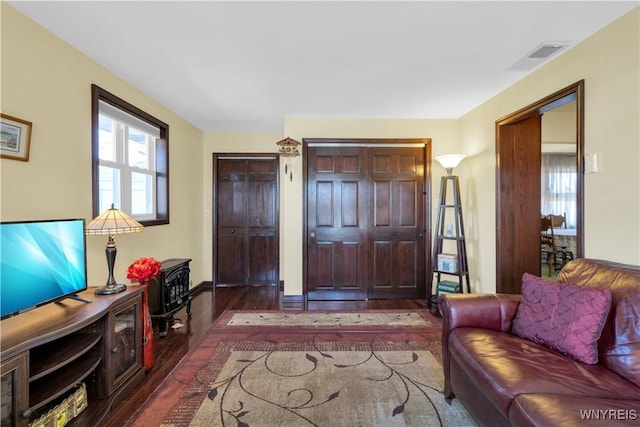 entryway featuring visible vents and wood finished floors