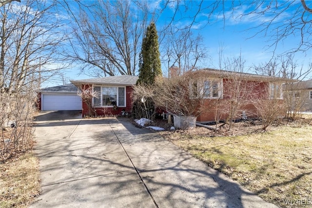 single story home with driveway, brick siding, and a chimney