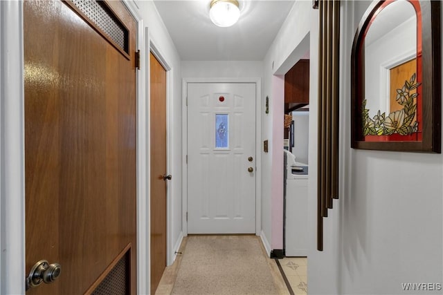 corridor featuring visible vents, light floors, and baseboards