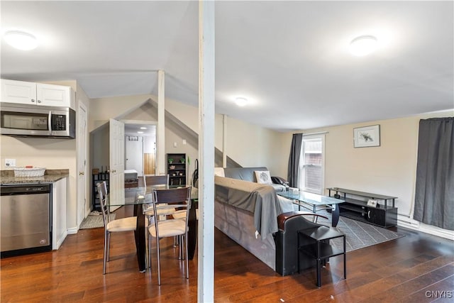 living room featuring dark wood-style floors