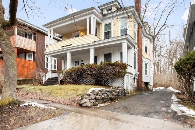 view of front of home featuring covered porch