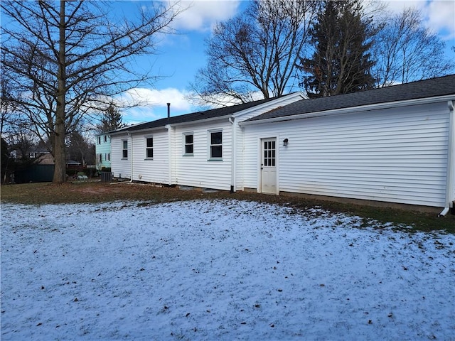 view of snow covered house