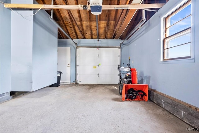 garage featuring a garage door opener