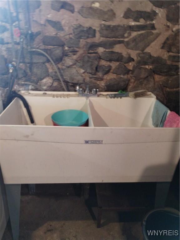 bathroom with a washtub