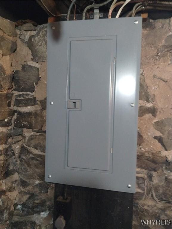 utility room featuring electric panel