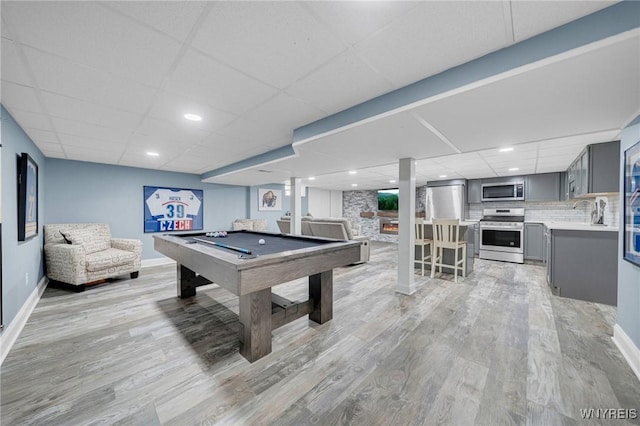 recreation room with baseboards, pool table, and light wood finished floors