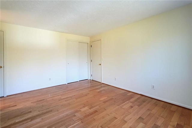 empty room with light wood-style floors