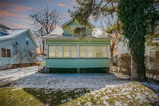 view of snow covered property