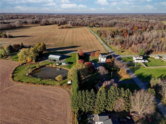 birds eye view of property featuring a rural view