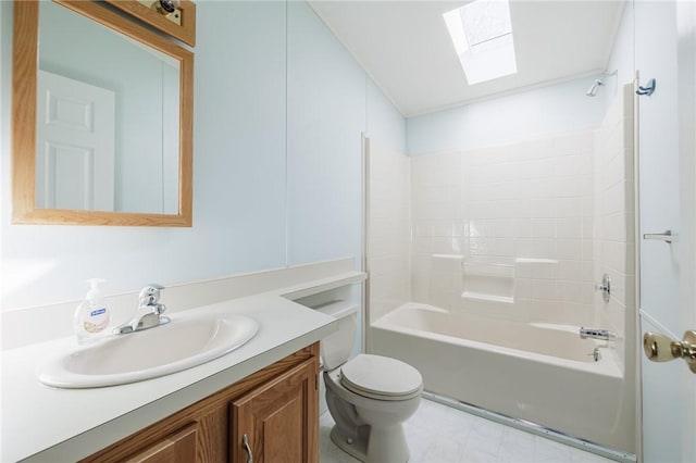 full bath featuring toilet, shower / bathtub combination, a skylight, and vanity