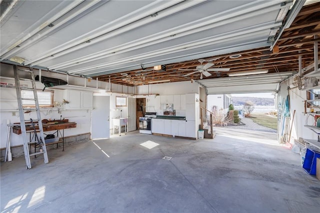 garage featuring freestanding refrigerator