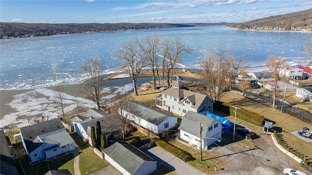 aerial view with a residential view and a water view