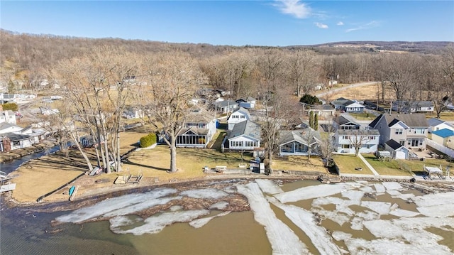 bird's eye view featuring a residential view and a forest view