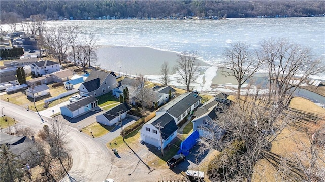 birds eye view of property with a residential view