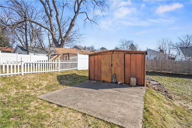 view of shed with a fenced backyard