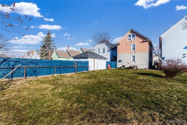 view of yard featuring a fenced backyard