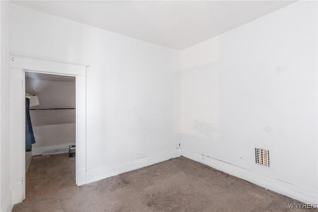 empty room featuring carpet floors