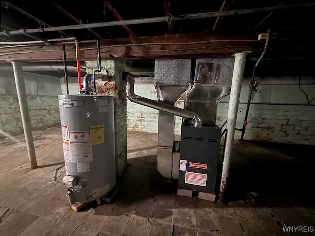 utility room featuring gas water heater