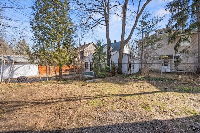 view of yard with fence