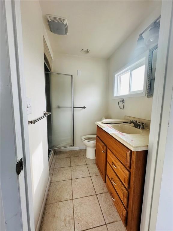 full bath featuring visible vents, toilet, a stall shower, tile patterned flooring, and vanity