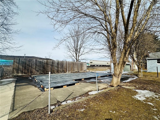 view of dock featuring fence