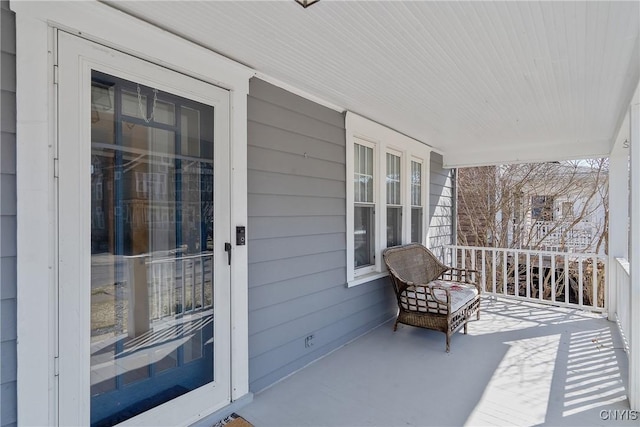 view of patio featuring a porch