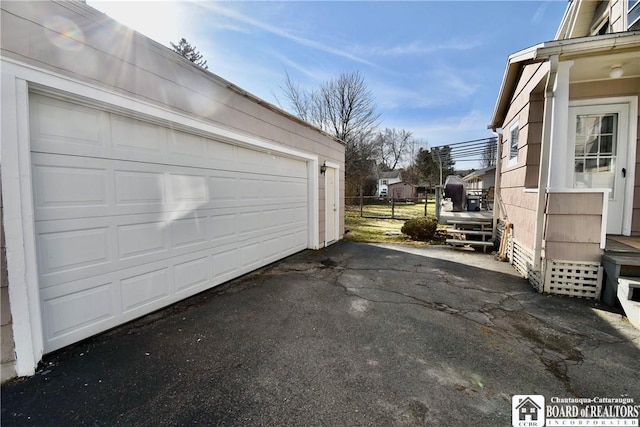 garage with driveway