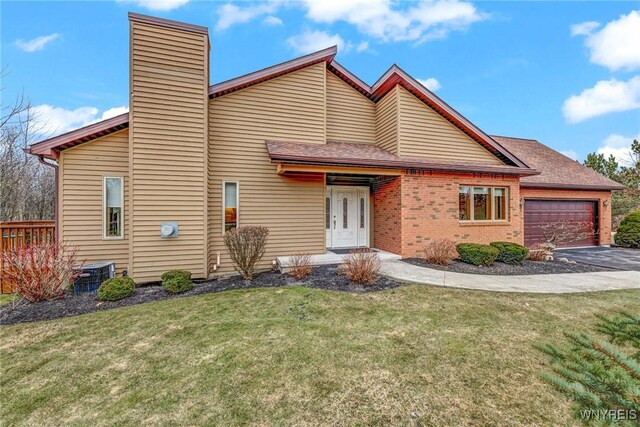 exterior space with brick siding, central air condition unit, a lawn, a chimney, and a garage