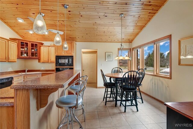 kitchen featuring black appliances, light tile patterned floors, wood ceiling, and lofted ceiling