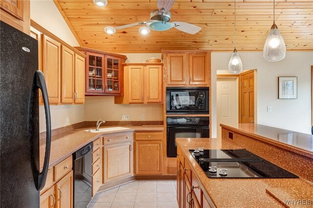 kitchen with black appliances, light tile patterned floors, wood ceiling, and a sink