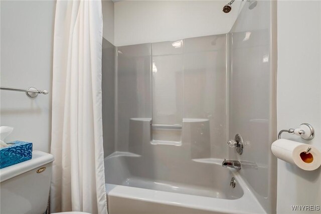 full bathroom with shower / bathtub combination with curtain and toilet