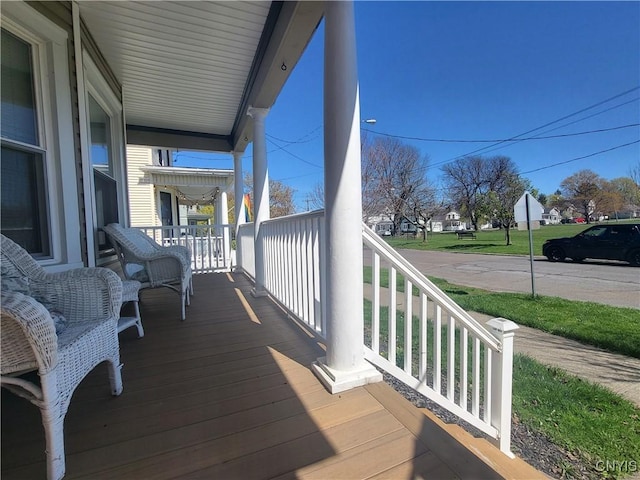 37 Niagara St, Oswego-City, NY 13126 - wooden deck with covered porch