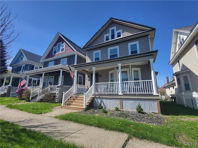 37 Niagara St, Oswego-City, NY 13126 - view of front facade with a porch