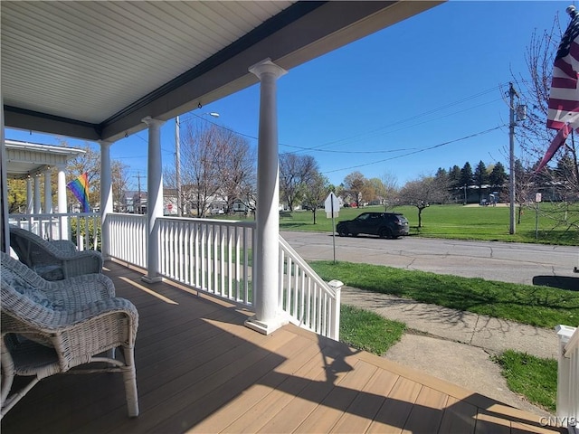 37 Niagara St, Oswego-City, NY 13126 - wooden deck with a porch