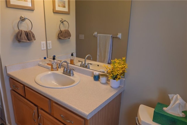 half bath with toilet and vanity