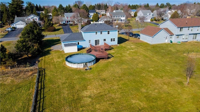 drone / aerial view with a residential view