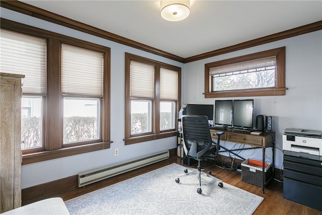 office featuring crown molding, a baseboard heating unit, and wood finished floors