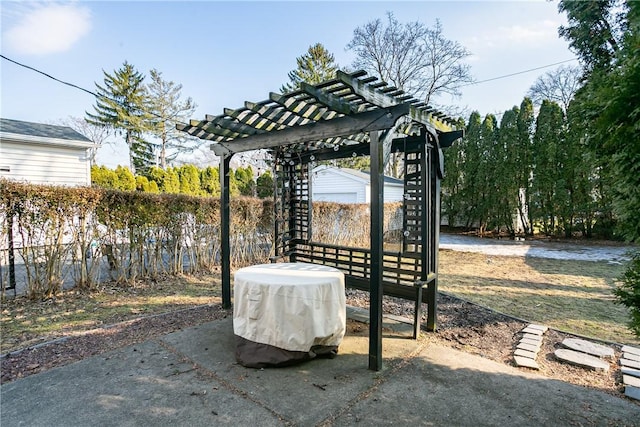 view of patio / terrace with fence and a pergola