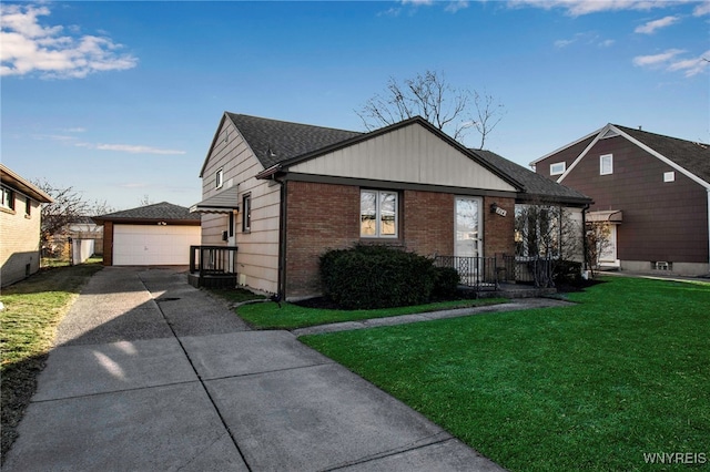 view of front of house featuring brick siding, a front lawn, roof with shingles, a garage, and an outbuilding