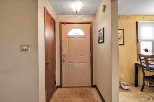 doorway with baseboards