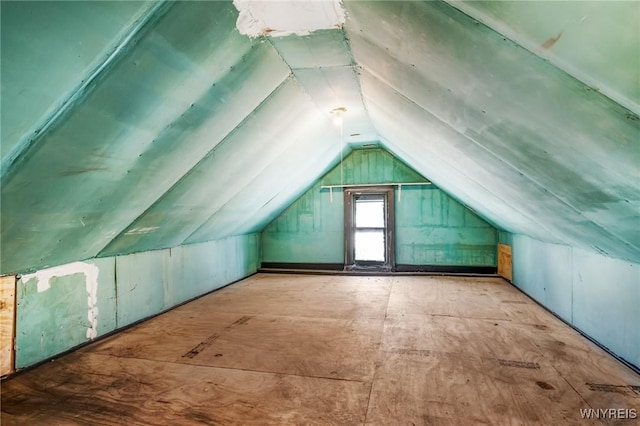 bonus room with vaulted ceiling