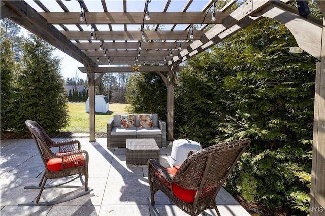 view of patio / terrace featuring an outdoor living space, a storage unit, an outbuilding, and a pergola