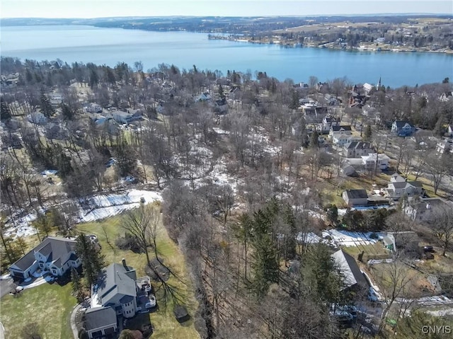 birds eye view of property featuring a water view