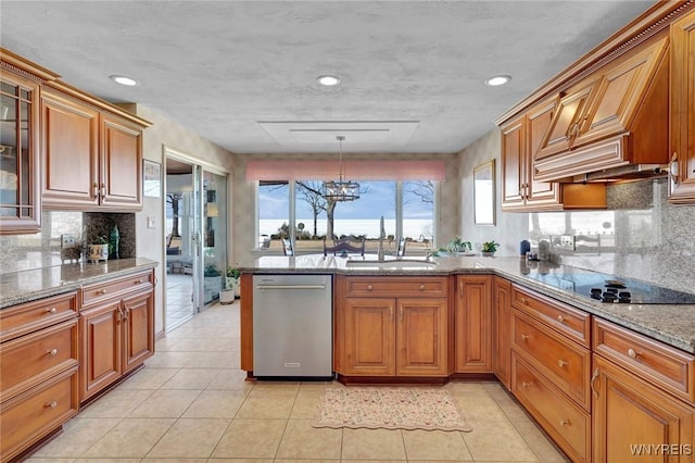 kitchen featuring a sink, stainless steel dishwasher, brown cabinetry, glass insert cabinets, and black electric stovetop