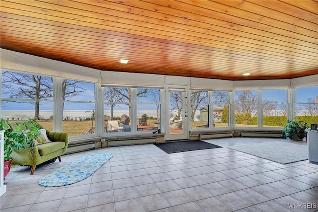 unfurnished sunroom with wood ceiling