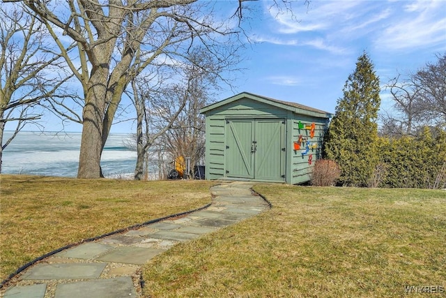 view of shed featuring a water view