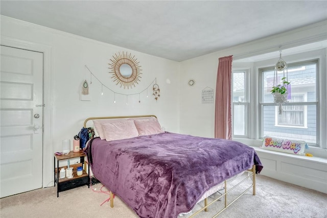 bedroom with light carpet