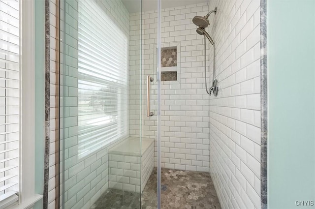 full bathroom featuring a stall shower