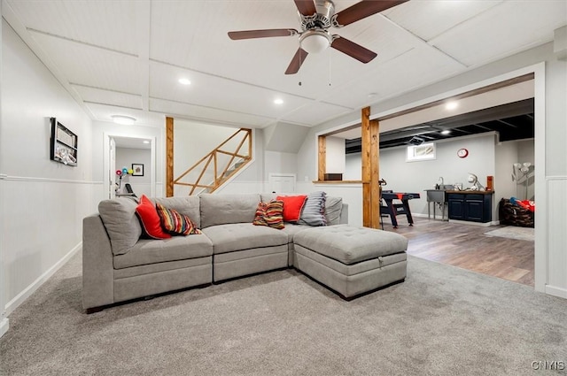 carpeted living room featuring recessed lighting, wood finished floors, and a ceiling fan